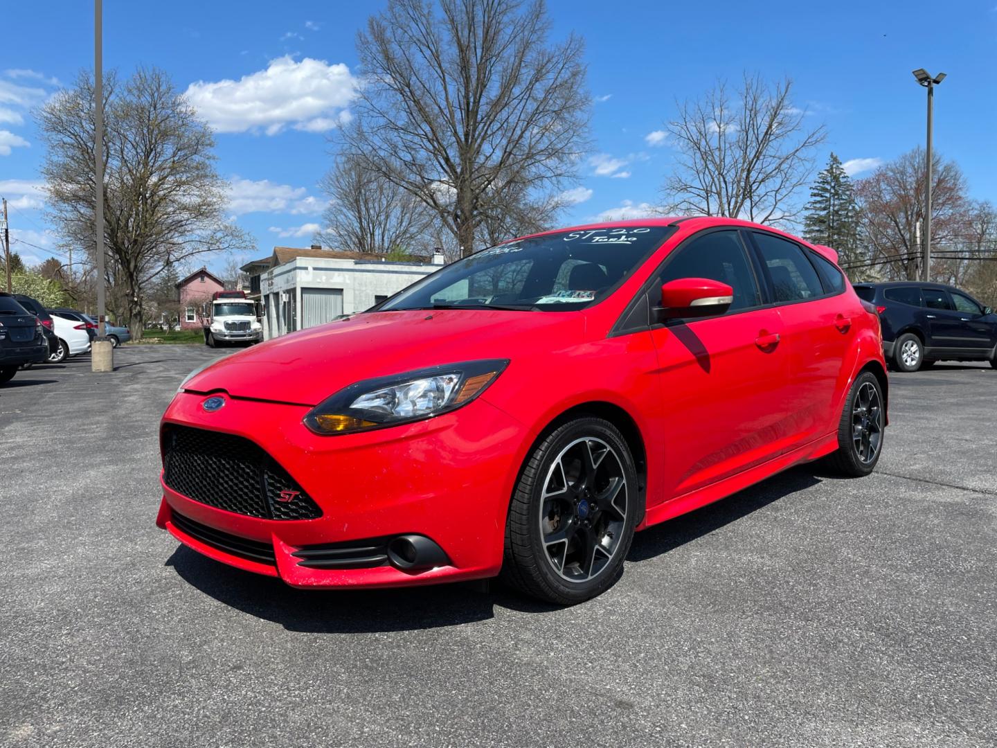 2014 Red Ford Focus ST Hatch (1FADP3L9XEL) with an 2.0L L4 DOHC 16V engine, located at 101 N. Main Street, Muncy, PA, 17756, (570) 546-5462, 41.207691, -76.785942 - Photo#0